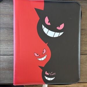 Red and Black Smiling Pokemon Character Tablet Case with cards